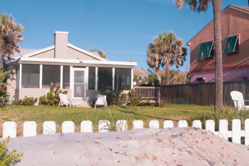 image of coastal bliss exterior with beach fence